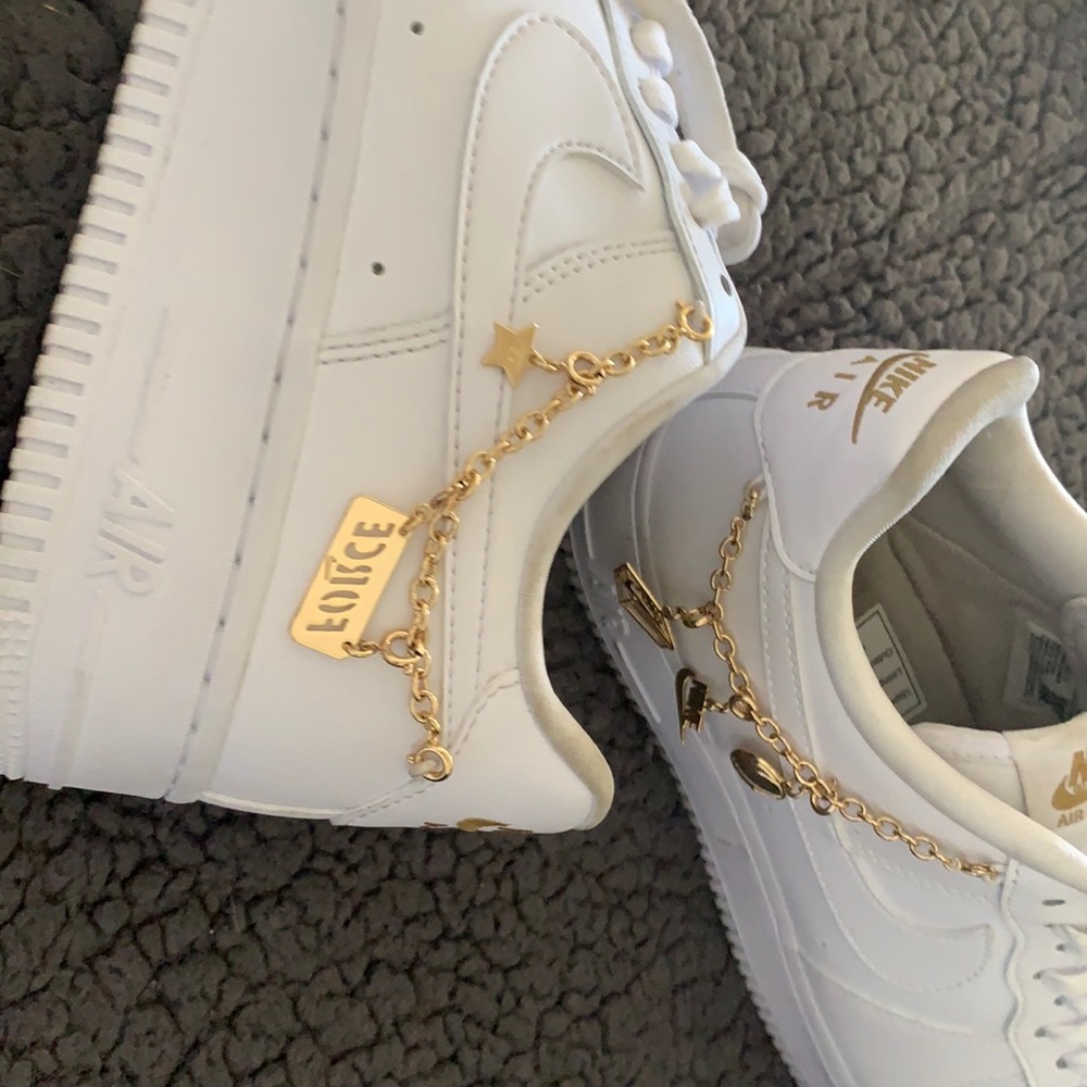 Air Force ones with gold writing and chain
